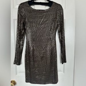 Beautiful and sexy black and gold long sleeve dress by GUESS